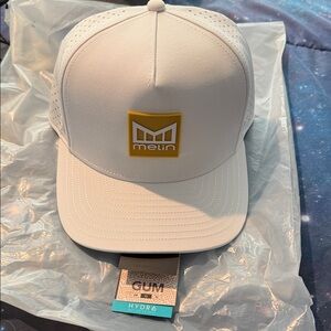 Melin Headwear White Trucker Hat with Yellow Logo Patch